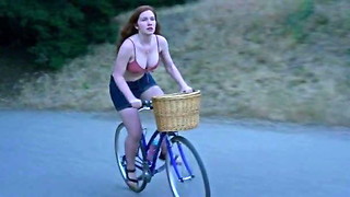 Annalise Basso railing a bike