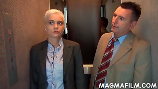 Huge-boobed office fuckslut plowed in an elevator