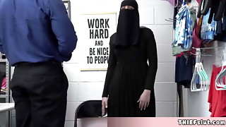 Adorable Muslim doll attempted to conceal some stolen stuff under her clothes