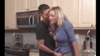 Mature trampy Janet James don't mind to be seduced by junior man