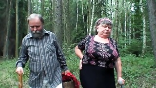 Abnormal grandma is fellating in the woods