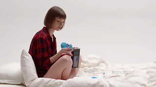 Teenage taunting herself with a vibro