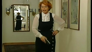 Mature sandy-haired lady and a youthful chisel