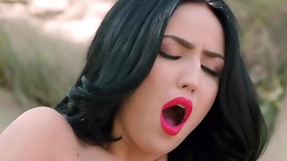 Brown-haired in golden high high-heeled shoes pushes thumbs into coochie