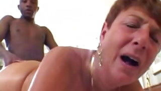 Mature bellows while being boinked by Big black cock