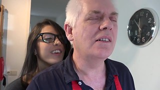 Youthful sweetheart in eyeglasses handles her older paramour orally and gets cunt porked in couch